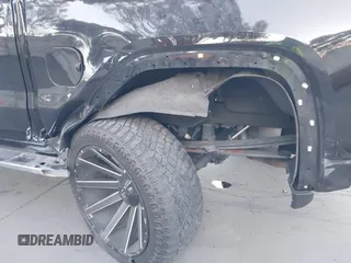 2021 GMC Sierra 1500 with VIN 1GTP8FED8MZ141471, listed as a IAAI auction lot 41306292 with Not Provided miles and . Bid and sale history available at DreamBid. Image 12.