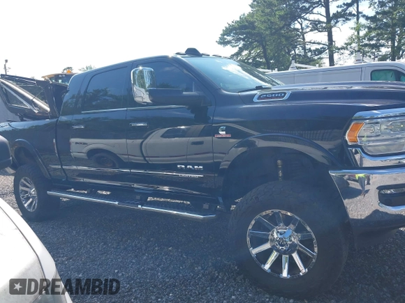 2022 Ram 2500 Limited with VIN 3C6UR5TLXNG377875, listed as a IAAI auction lot 42610178 with 46,390 mi miles and . Bid and sale history available at DreamBid. Image 13.