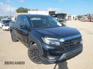 2022 Honda Ridgeline RTL-E z VIN 5FPYK3F73NB033366, wystawiony jako IAAI lot #40355769 z przebiegiem 35 331 mil mil oraz . Historia ofert i sprzedaży dostępna na DreamBid. Obrazek 1.