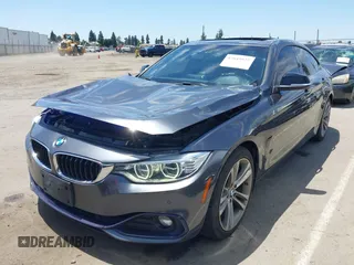 2015 BMW 4 Series 428i with VIN WBA4A5C59FG052596, listed as a IAAI auction lot 42649927 with 68,842 mi miles and . Bid and sale history available at DreamBid. Image 18.