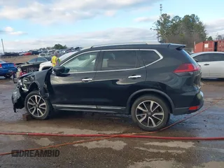 2019 Nissan Rogue SL with VIN 5N1AT2MT0KC789324, listed as a IAAI auction lot 41149814 with 73,213 mi miles and . Bid and sale history available at DreamBid. Image 14.