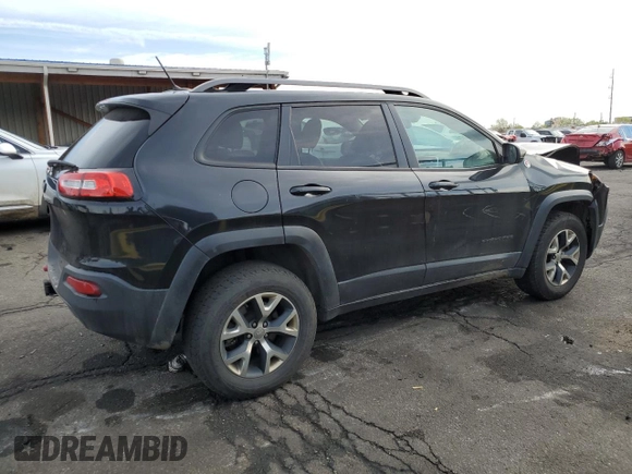 2015 Jeep Cherokee Trailhawk with VIN 1C4PJMBS9FW521872, listed as a Copart auction lot 55338955 with 146,602 mi miles and Salvage title. Bid and sale history available at DreamBid. Image 3.