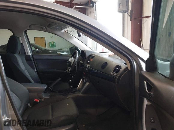 2015 Mazda CX-5 Sport z VIN JM3KE2BE8F0434889, wystawiony jako IAAI lot #42259894 z przebiegiem 298 835 mil mil oraz . Historia ofert i sprzedaży dostępna na DreamBid. Obrazek 5.
