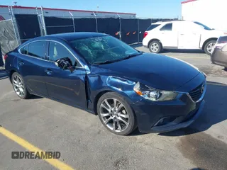 2015 Mazda 6 i Grand Touring with VIN JM1GJ1W58F1182442, listed as a IAAI auction lot 41965983 with 142,000 mi miles. Bid and sale history available at carsss.com. Image 1.