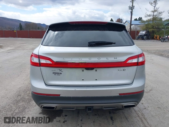 2016 Lincoln MKX Select with VIN 2LMTJ8KR6GBL59043, listed as a IAAI auction lot 41892601 with 113,756 mi miles. Bid and sale history available at carsss.com. Image 16.