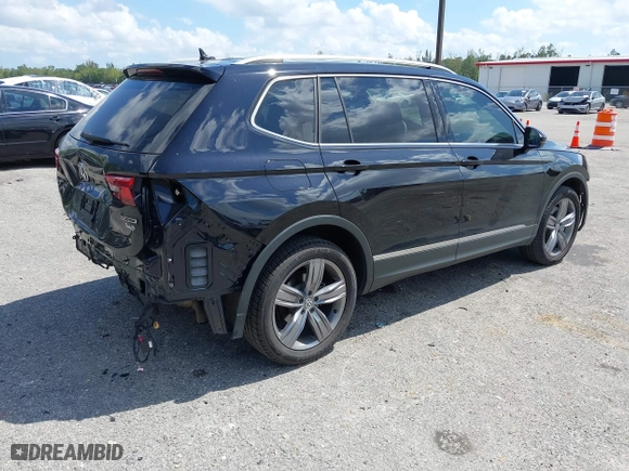 2021 Volkswagen Tiguan SE with VIN 3VV2B7AX1MM150534, listed as a IAAI auction lot 41814162 with 49,079 mi miles. Bid and sale history available at carsss.com. Image 4.