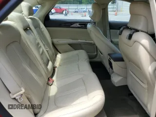 2014 Lincoln MKZ z VIN 3LN6L2GK4ER825465, wystawiony jako Copart lot #55911345 z przebiegiem 78 783 mil mil oraz Szkoda całkowita • Salvage title. Historia ofert i sprzedaży dostępna na DreamBid. Obrazek 10.