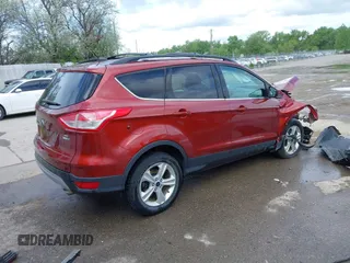 2014 Ford Escape SE z VIN 1FMCU9GX8EUB98766, wystawiony jako IAAI lot #42256143 z przebiegiem 64 074 mil mil oraz . Historia ofert i sprzedaży dostępna na DreamBid. Obrazek 4.