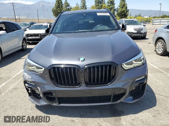 2021 BMW X5 xDrive40i with VIN 5UXCR6C06M9H65380, listed as a Copart auction lot 57445405 with 33,916 mi miles and Salvage title. Bid and sale history available at DreamBid. Image 5.