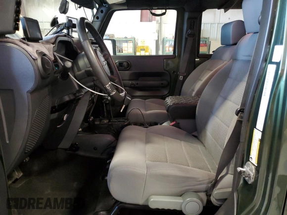 2008 Jeep Wrangler Unlimited Rubicon with VIN 1J4GA69148L591013, listed as a Copart auction lot 53931315 with 164,396 mi miles and Clean title. Bid and sale history available at DreamBid. Image 7.