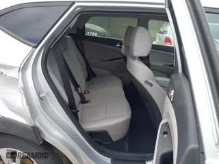 2019 Hyundai Tucson Value with VIN KM8J33A48KU927012, listed as a IAAI auction lot 41515397 with 62,501 mi miles. Bid and sale history available at carsss.com. Image 8.