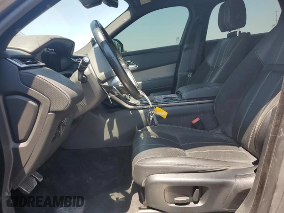 2019 Land Rover Range Rover Velar R-Dynamic SE с VIN SALYL2EX9KA779433, выставлен на аукционе Copart как лот 61991695 с пробегом 70 070 миль миль и Чистый • Clean title. История ставок и продаж доступна на DreamBid. Изображение 7.