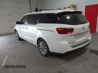 2019 Kia Sedona L with VIN KNDMA5C1XK6524868, listed as a IAAI auction lot 41048602 with 82,511 mi miles. Bid and sale history available at carsss.com. Image 3.