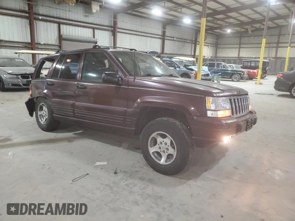 1996 Jeep Grand Cherokee Laredo with VIN 1J4EX58S5TC133225, listed as a Copart auction lot 49132214 with 233,886 mi miles and Non Repairable. Bid and sale history available at carsss.com. Image 4.