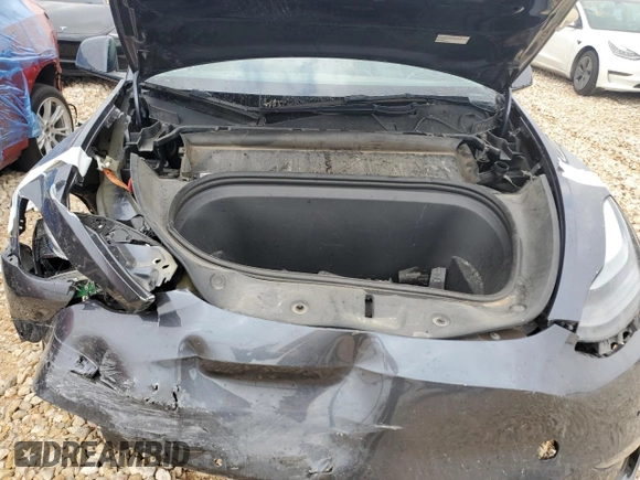 2022 Tesla Model Y Long Range z VIN 7SAYGAEE4NF543503, wystawiony jako Copart lot #47143155 z przebiegiem 53 874 mil mil oraz Szkody całkowita. Historia ofert i sprzedaży dostępna na DreamBid. Obrazek 12.