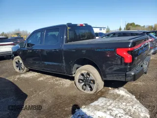 2023 Ford F-150 Lightning Pro z VIN 1FT6W1EV3PWG03292, wystawiony jako Copart lot #48454435 z przebiegiem 41 714 mil mil oraz Tytuł czysty. Historia ofert i sprzedaży dostępna na DreamBid. Obrazek 2.