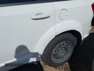 2017 Dodge Journey SE with VIN 3C4PDCAB4HT626945, listed as a IAAI auction lot 41209102 with 158,288 mi miles and . Bid and sale history available at DreamBid. Image 17.