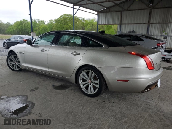 2016 Jaguar XJ Portfolio with VIN SAJWA2G70G8V93006, listed as a Copart auction lot 52324635 with 123,690 mi miles and Salvage Title. Bid and sale history available at DreamBid. Image 2.