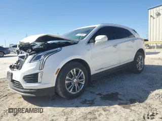 2021 Cadillac XT5 FWD Premium Luxury with VIN 1GYKNCRSXMZ135949, listed as a Copart auction lot 47752805 with 99,838 mi miles and Salvage Title. Bid and sale history available at carsss.com. Image 1.
