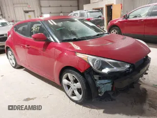 2013 Hyundai Veloster w/Gray Int with VIN KMHTC6AD2DU136990, listed as a IAAI auction lot 41363689 with 74,594 mi miles. Bid and sale history available at carsss.com. Image 1.