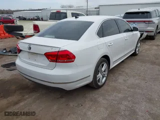 2013 Volkswagen Passat TDI SEL Premium with VIN 1VWCN7A3XDC118087, listed as a IAAI auction lot 41780198 with 305,872 mi miles. Bid and sale history available at carsss.com. Image 4.