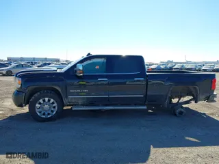 2017 GMC Sierra 2500HD Denali with VIN 1GT12UEY5HF118445, listed as a IAAI auction lot 41327986 with 158,970 mi miles. Bid and sale history available at carsss.com. Image 14.