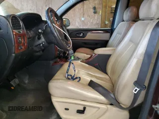 2007 GMC Envoy SLT with VIN 1GKDT13SX72108964, listed as a Copart auction lot 72528314 with 174,163 mi miles and Salvage Title. Bid and sale history available at carsss.com. Image 7.
