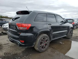 2012 Jeep Grand Cherokee SRT8 with VIN 1C4RJFDJ4CC350907, listed as a Copart auction lot 49409205 with 171,352 mi miles and Clean Title. Bid and sale history available at carsss.com. Image 3.