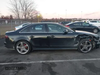 2013 Audi A4 2.0T Prestige with VIN WAUKFAFL9DN015049, listed as a IAAI auction lot 40975645 with 104,407 mi miles. Bid and sale history available at carsss.com. Image 13.