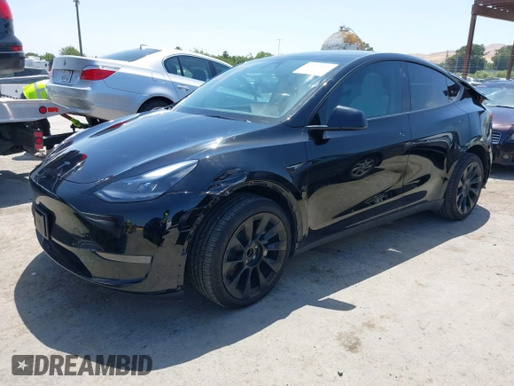 2024 Tesla Model Y with VIN 7SAYGDED9RF191453, listed as a IAAI auction lot 42272051 with 7,805 mi miles and . Bid and sale history available at DreamBid. Image 20.