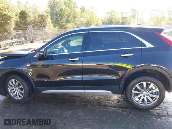 2021 Cadillac XT4 FWD Premium Luxury with VIN 1GYFZCR43MF052422, listed as a IAAI auction lot 41985859 with 25,112 mi miles. Bid and sale history available at carsss.com. Image 14.
