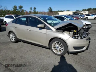 2018 Ford Focus SE with VIN 1FADP3F23JL219189, listed as a Copart auction lot 52209335 with 101,180 mi miles and Salvage title. Bid and sale history available at DreamBid. Image 4.