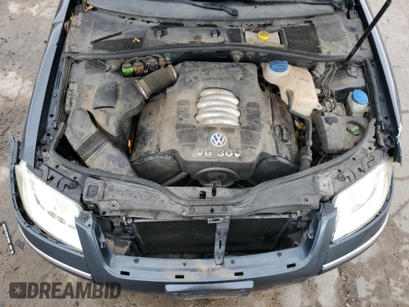2003 Volkswagen Passat GLX z VIN WVWYH63B93E307461, wystawiony jako Copart lot #81961384 z przebiegiem 139 029 mil mil oraz Szkoda całkowita • Salvage title. Historia ofert i sprzedaży dostępna na DreamBid. Obrazek 11.