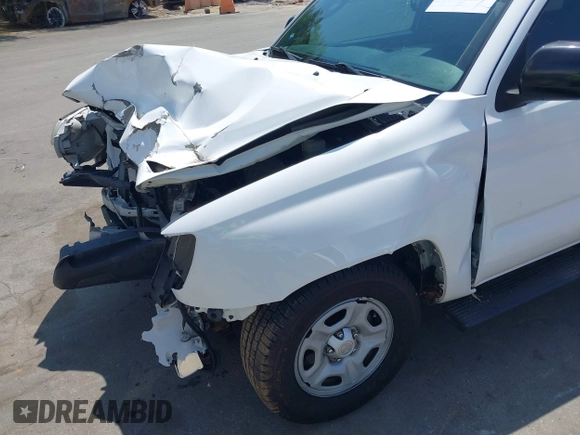 2014 Toyota Tacoma with VIN 5TFNX4CN0EX040545, listed as a IAAI auction lot 42159053 with 66,629 mi miles and . Bid and sale history available at DreamBid. Image 6.