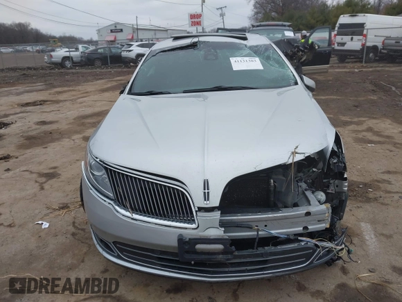 2013 Lincoln MKS EcoBoost with VIN 1LNHL9FT9DG611640, listed as a IAAI auction lot 41131303 with 135,550 mi miles and . Bid and sale history available at DreamBid. Image 12.