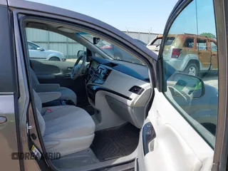 2014 Toyota Sienna LE AAS with VIN 5TDKK3DC4ES431664, listed as a IAAI auction lot 42081429 with 208,505 mi miles and . Bid and sale history available at carsss.com. Image 5.