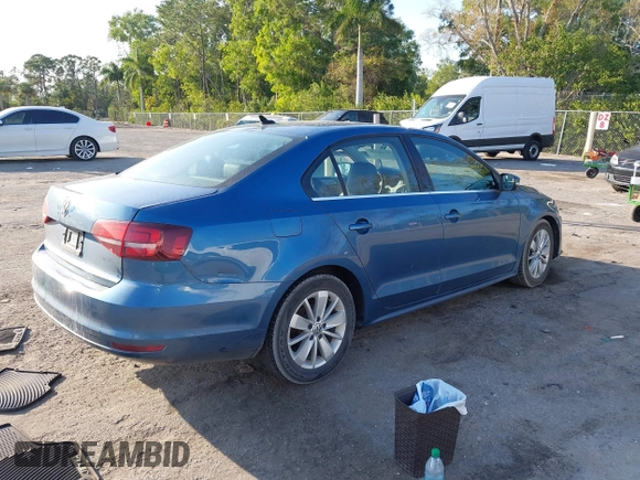2016 Volkswagen Jetta Sedan 1.4T SE with VIN 3VWD67AJ0GM328412, listed as a IAAI auction lot 41556254 with 137,814 mi miles. Bid and sale history available at carsss.com. Image 4.