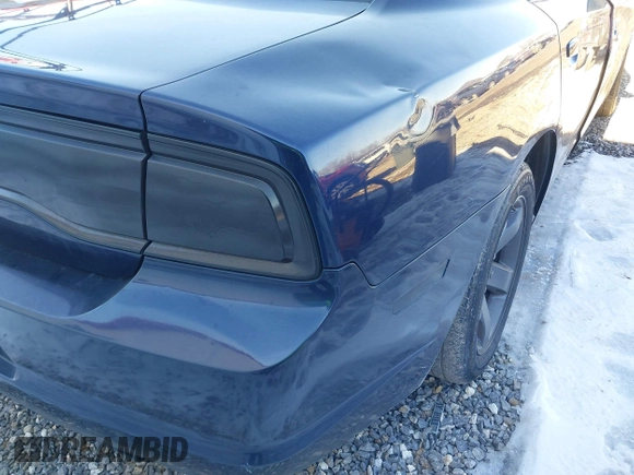 2014 Dodge Charger SE with VIN 2C3CDXBG4EH295650, listed as a IAAI auction lot 41274248 with 259,390 mi miles and . Bid and sale history available at carsss.com. Image 21.