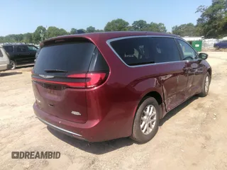 2023 Chrysler Pacifica Touring L with VIN 2C4RC1BG5PR505661, listed as a IAAI auction lot 42675532 with 8,525 mi miles and . Bid and sale history available at DreamBid. Image 4.