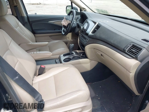 2017 Honda Pilot EX-L with VIN 5FNYF6H50HB033968, listed as a IAAI auction lot 42400720 with 119,597 mi miles and . Bid and sale history available at DreamBid. Image 5.