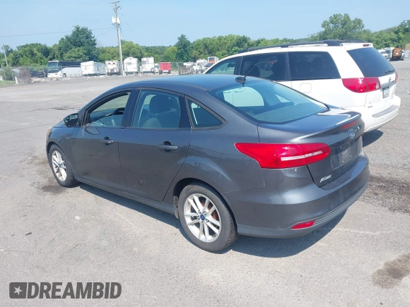 2016 Ford Focus SE with VIN 1FADP3F28GL403388, listed as a IAAI auction lot 42800054 with 190,860 mi miles and . Bid and sale history available at DreamBid. Image 3.
