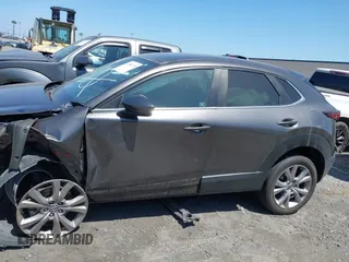 2021 Mazda CX-30 Select z VIN 3MVDMABL3MM233701, wystawiony jako IAAI lot #42086778 z przebiegiem Nie podano mil oraz . Historia ofert i sprzedaży dostępna na DreamBid. Obrazek 15.