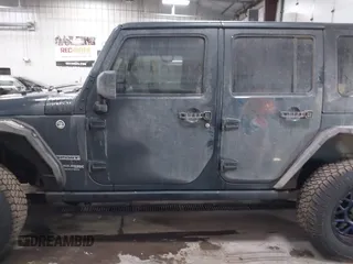 2018 Jeep Wrangler JK Unlimited Sport with VIN 1C4BJWDG0JL867687, listed as a IAAI auction lot 41426838 with 78,116 mi miles. Bid and sale history available at carsss.com. Image 14.