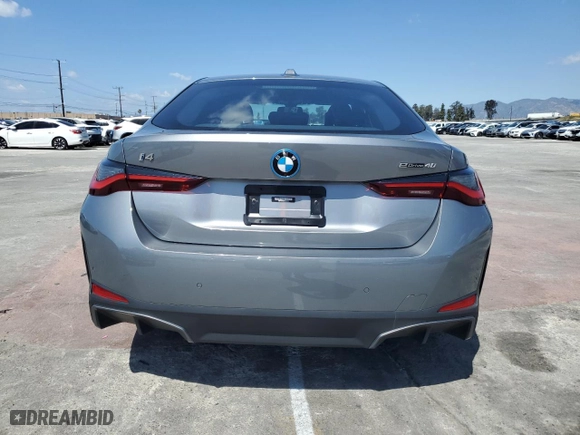 2023 BMW i4 eDrive40 with VIN WBY73AW02PFN60384, listed as a Copart auction lot 48636984 with 13,504 mi miles. Bid and sale history available at carsss.com. Image 6.