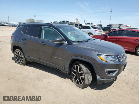 2018 Jeep Compass Limited with VIN 3C4NJDCB9JT261879, listed as a Copart auction lot 56523365 with 172,382 mi miles and Salvage title. Bid and sale history available at DreamBid. Image 4.