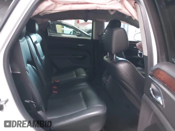 2014 Cadillac SRX Performance Collection with VIN 3GYFNFE36ES615440, listed as a IAAI auction lot 41830849 with 125,128 mi miles and . Bid and sale history available at DreamBid. Image 8.