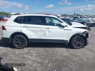 2024 Volkswagen Tiguan SE z VIN 3VV3B7AX3RM120298, wystawiony jako IAAI lot #41862454 z przebiegiem Nie podano mil oraz . Historia ofert i sprzedaży dostępna na DreamBid. Obrazek 13.