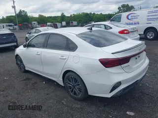2023 Kia Forte GT-Line z VIN 3KPF54ADXPE621767, wystawiony jako IAAI lot #41991079 z przebiegiem 27 124 mil mil oraz . Historia ofert i sprzedaży dostępna na DreamBid. Obrazek 3.