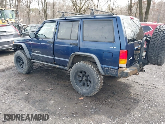 2000 Jeep Cherokee Classic with VIN 1J4FF58SXYL163514, listed as a IAAI auction lot 41920054 with 259,677 mi miles. Bid and sale history available at carsss.com. Image 3.