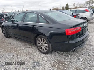 2013 Audi A6 3.0T Prestige with VIN WAUHGAFCXDN053087, listed as a IAAI auction lot 40840631 with 62,567 mi miles. Bid and sale history available at carsss.com. Image 3.